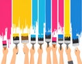 Several hands hold paintbrushes, each applying vivid paint strokes Royalty Free Stock Photo