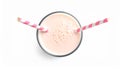 Glass with delicious milk shake on white background, top view Royalty Free Stock Photo