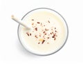 Glass with delicious milk shake on white background, top view Royalty Free Stock Photo