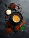 Various spices and seasonings for making aromatic coffee-based drinks. Black coffee Royalty Free Stock Photo