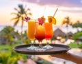 Generates the image of a hand holding a tray with tropical drinks and the hotel backg Royalty Free Stock Photo