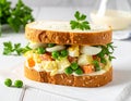 Photo of a fresh, bright sandwich filled with traditional Polish vegetable salad. Royalty Free Stock Photo