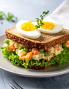 Photo of a fresh, bright sandwich filled with traditional Polish vegetable salad. Royalty Free Stock Photo