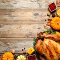 Flat lay composition with turkey on wooden background, space for text. Happy Thanksgiving Royalty Free Stock Photo
