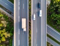 Aerial view of a highway with two parallel lanes, each carrying vehicles Royalty Free Stock Photo