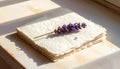 Lavender Sprig on Textured Paper Stack Royalty Free Stock Photo