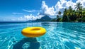 Yellow pool float, floating ring in a refreshing blue swimming pool. Royalty Free Stock Photo