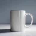 Minimal White Ceramic Mug on Clean Surface with Soft Studio Light and Modern Mockup Style Product Design Presentation. Royalty Free Stock Photo