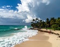 Outdoor photo of remote tropical island with a hurricane coming over the horizen