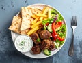 Spicy bifteki, frikadelle or frikkadel meatballs with minced beef and lamb with pita Royalty Free Stock Photo