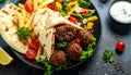 Spicy bifteki, frikadelle or frikkadel meatballs with minced beef and lamb with pita Royalty Free Stock Photo