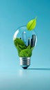 a green bulb made with 3d leaves and made with 3d tmt bars with blue background Royalty Free Stock Photo