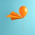 Minimal balloon 3D image of simple hand made paper airplane, made with orange paper Royalty Free Stock Photo