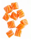 Salmon slices isolated on white background with clipping path, red fish cubes, ingred Royalty Free Stock Photo