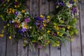 Beautiful floral wreath from meadow flowers. A colorful variety of summer wildflowers. Royalty Free Stock Photo