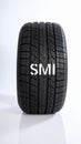 Close-up of a tire with the letters SMI. Royalty Free Stock Photo