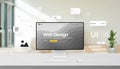 Computer display on office desk surrounded by floating UI elements Royalty Free Stock Photo