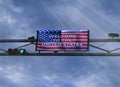 Digital Sign with American Flag stating Welcome To The United States against a cloudy skyd image Royalty Free Stock Photo