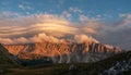 Generated image, Dramatic cloud formations hover over the Dolomite Mountains. Royalty Free Stock Photo