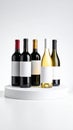 Elegant wine bottles with blank white labels on a modern white display stand clean studio shot Royalty Free Stock Photo