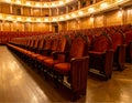 Generated image. An empty theater with lots of comfortable red seats. Royalty Free Stock Photo