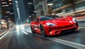 Fast red car. A modern car speeds along a city highway Royalty Free Stock Photo