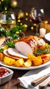 Festive Roast Dinner with Wine and Christmas Tree Bokeh Royalty Free Stock Photo