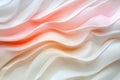 Flowing fabric features soft waves in shades of cream and light coral tones. Royalty Free Stock Photo