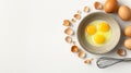 Fresh cracked eggs in ceramic bowl flour, shells, and whole brown eggs placed on clean white table Royalty Free Stock Photo