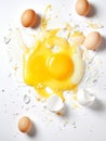 Fresh cracked eggs in ceramic bowl flour, shells, and whole brown eggs placed on clean white table Royalty Free Stock Photo