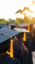 Graduates wearing caps and gowns at commencement ceremony Royalty Free Stock Photo