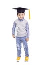 Happy Asian school kid graduate in graduation cap Royalty Free Stock Photo