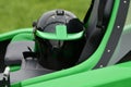 Helmet on a two-seater green gyrocopter at the airfield Royalty Free Stock Photo