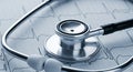 Stethoscope on ECG Heart Rhythm Chart â Blue-Toned Medical Diagnostic Close-Up Royalty Free Stock Photo