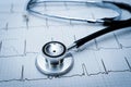 Stethoscope on ECG Heart Rhythm Chart â Blue-Toned Medical Diagnostic Close-Up Royalty Free Stock Photo