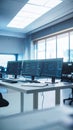 Modern Office Workspace with Computer Monitors Displaying Code Royalty Free Stock Photo