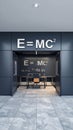 Modern physics classroom with Einstein's theory of relativity formula on blackboard Royalty Free Stock Photo