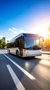 Modern white bus driving on a highway at sunset with motion blur effect Royalty Free Stock Photo