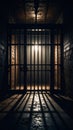 Mysterious dark jail corridor with intense light behind cell bars casting long shadows Royalty Free Stock Photo