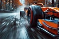 orange formula one racing car driving fast on race track in nature close up Royalty Free Stock Photo