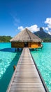 Overwater Bungalow and Dock on Tropical Lagoon Paradise Holiday Royalty Free Stock Photo