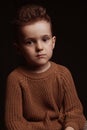 Portrait of serious sad stylish white caucasian child boy kid preschooler Royalty Free Stock Photo