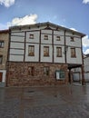 Traditional half-timbered house with stone base in Ezcaray, La Rioja Royalty Free Stock Photo