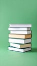Stack of Books on Green Background Royalty Free Stock Photo
