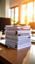 Stack of Documents on Office Desk with Sunlight Royalty Free Stock Photo