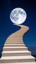 Staircase Ascending Towards a Large Full Moon Under a Starry Night Sky Royalty Free Stock Photo