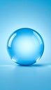 Transparent blue glass sphere on a gradient background for abstract concepts Royalty Free Stock Photo