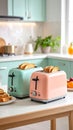 Two pastel kitchen toasters with golden bread on a modern white table in a bright home kitchen Royalty Free Stock Photo