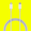 Type-C and Lightning cable and connector, insulated on yellow background Royalty Free Stock Photo