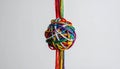 Tangled Colorful Yarn with Single Thread Pulled Chaos and Problem-Solving Concept Royalty Free Stock Photo